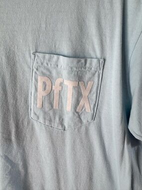 PFTX Men's Light Blue Pocket Tee. Size L